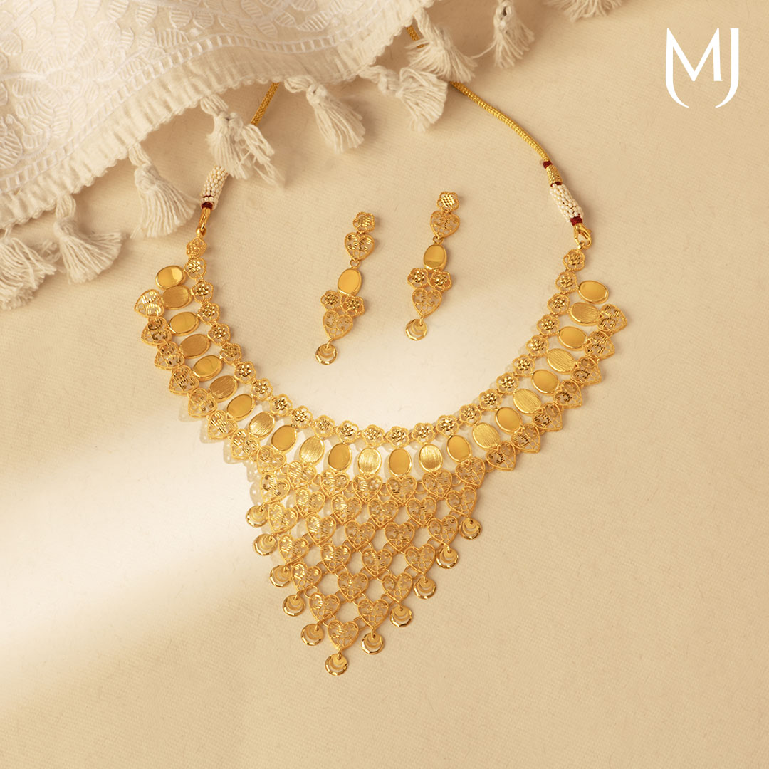 Medium Gold Set Buy Gold Set Online | Gold Set by Manubhai.